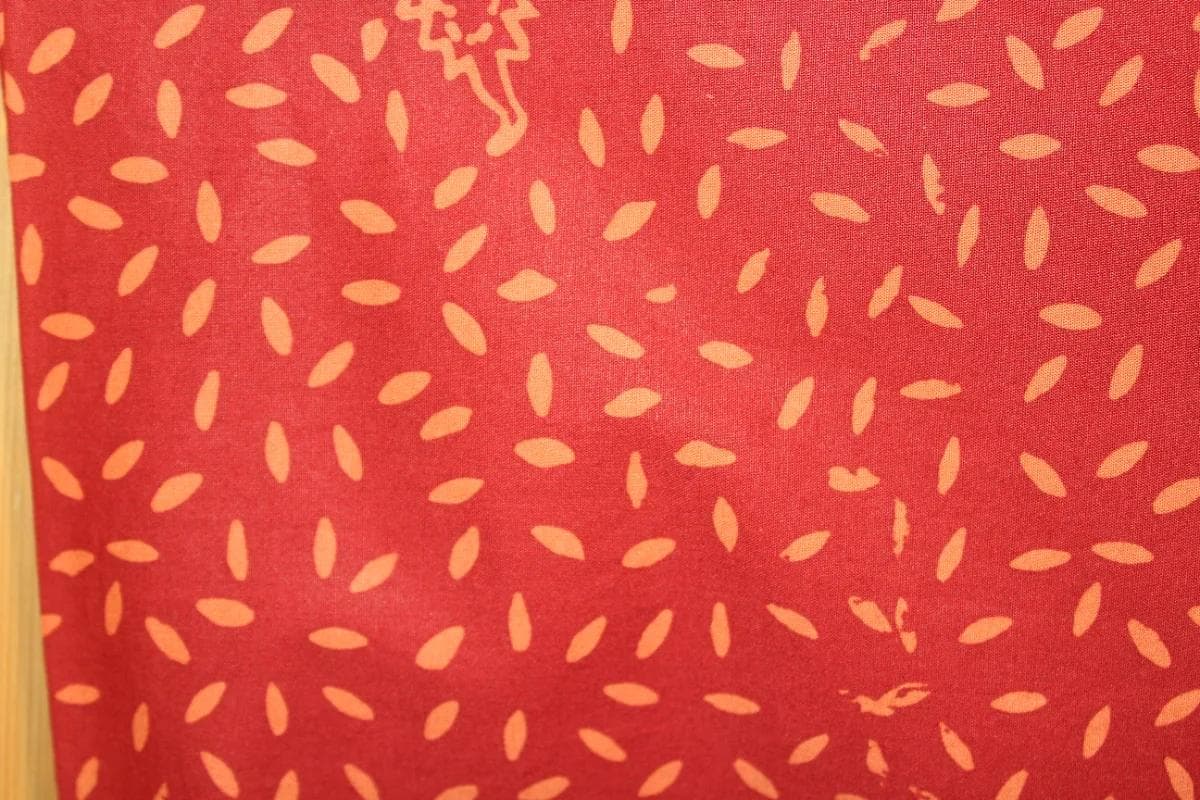 Red batik fabric pattern