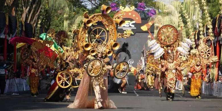 Colorful cultural parade at Banyuwangi Ethno Carnival featuring ethnic costumes and traditional performances.